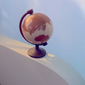 Our Generation Doll around the world globe